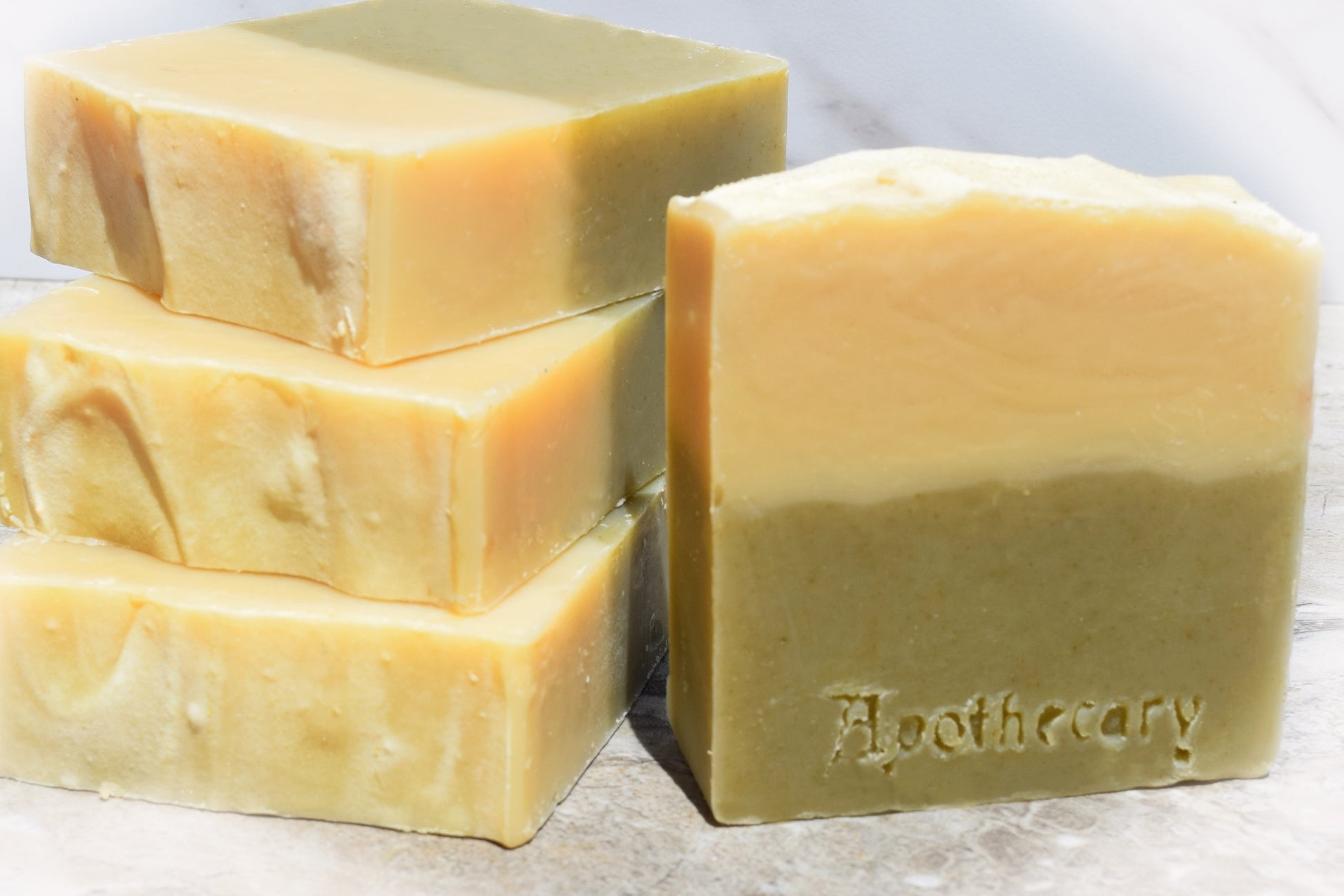 Green and cream soap scented with vetiver and bergamot