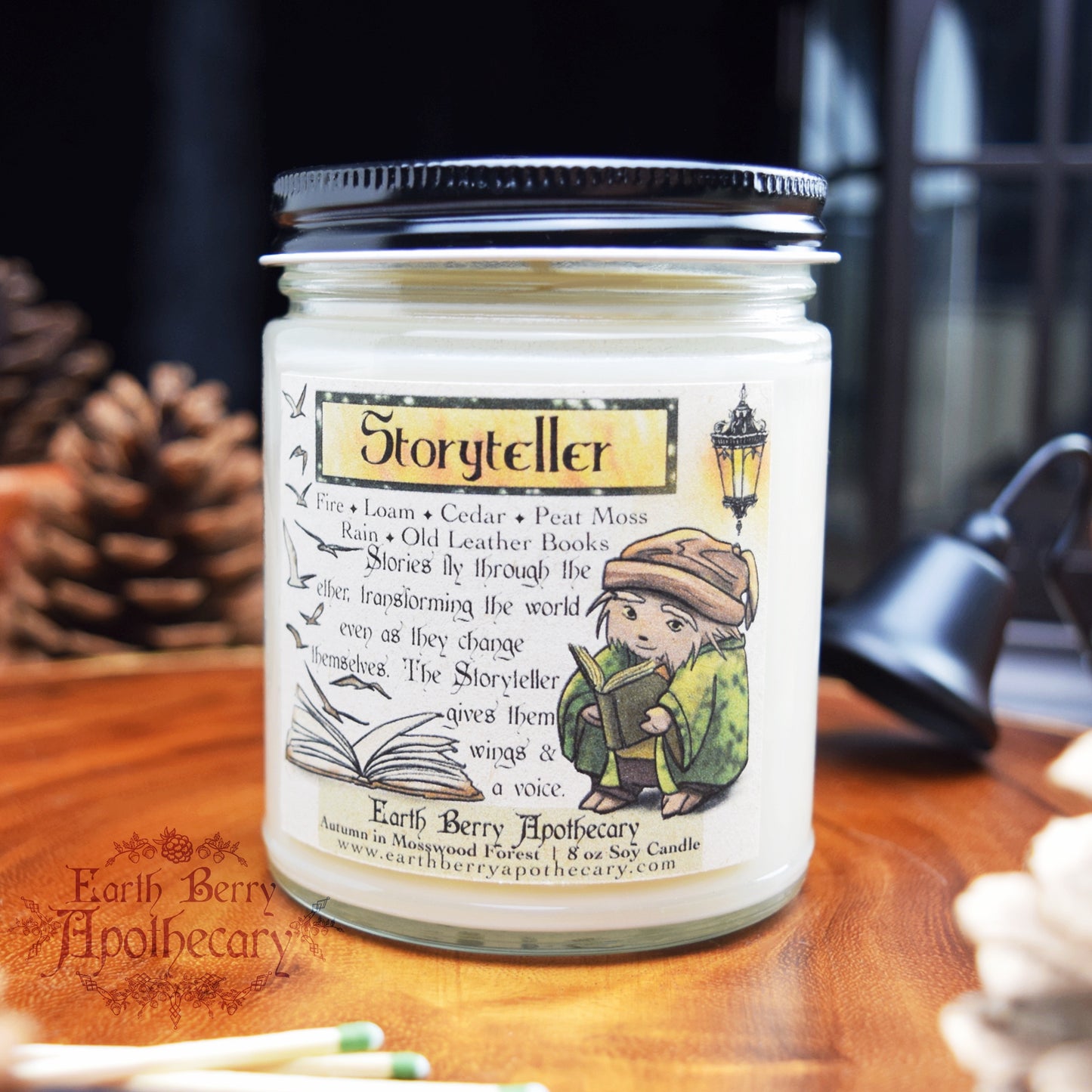 Woodfire, loam, cedar, and leather book scented candle called Storyteller. Fantasy candles.