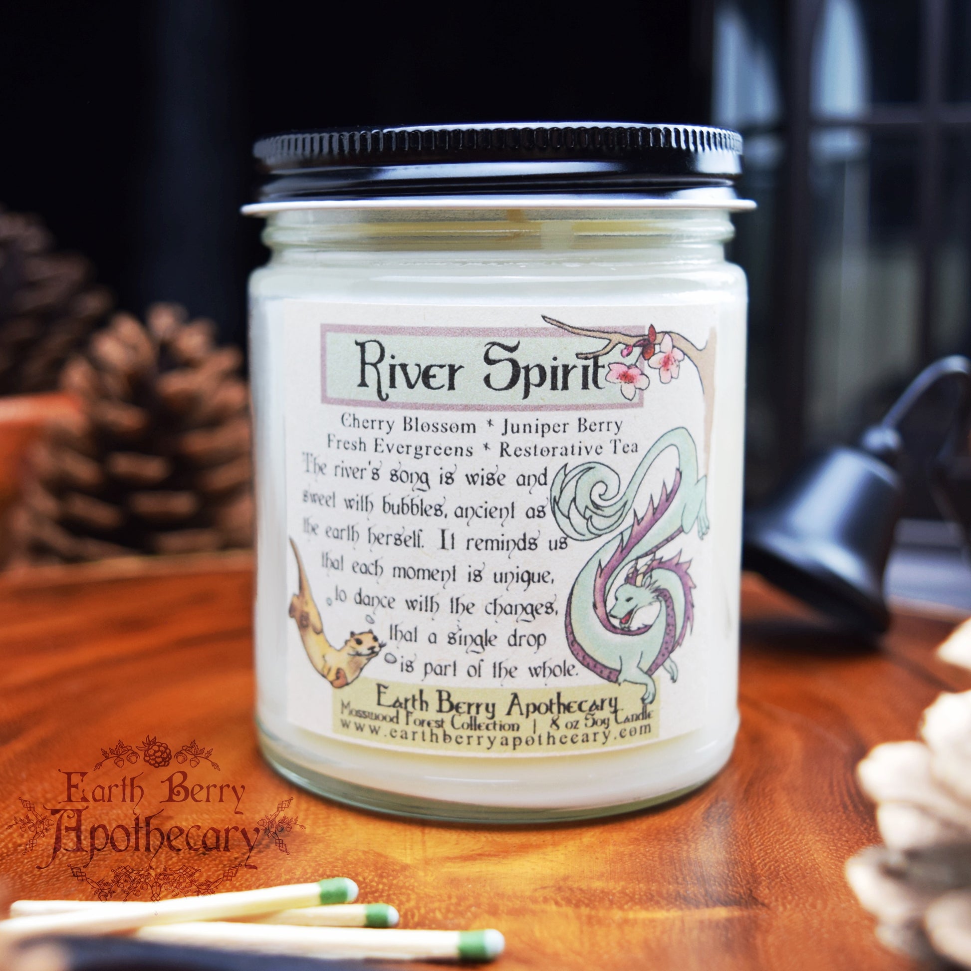 Fresh jasmine spa scented candle called river spirit. Otter and dragon candle