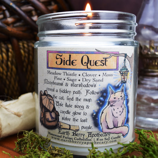 Side quest soy candle scented with Clover, pine, and moss.